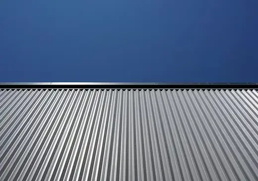 Standing seam metal commercial roofing system installed by Ellis Builders in New Haven County CT