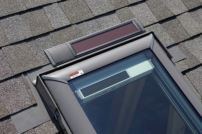 VELUX skylight installed on an asphalt shingle roof