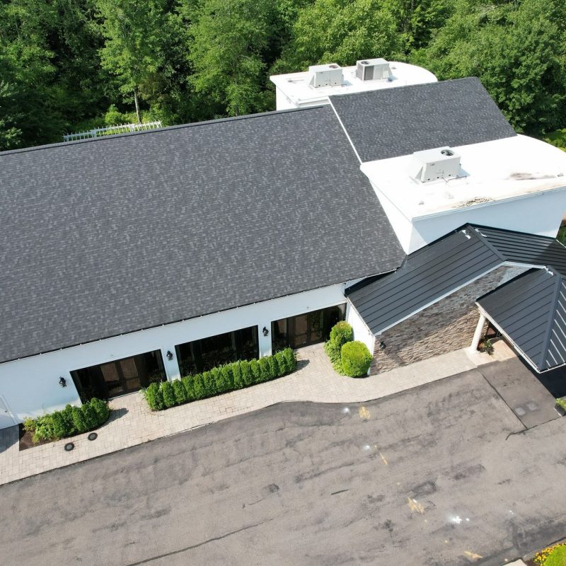 Standing seam metal roofing completed at Cascade in Hamden by Ellis Builders