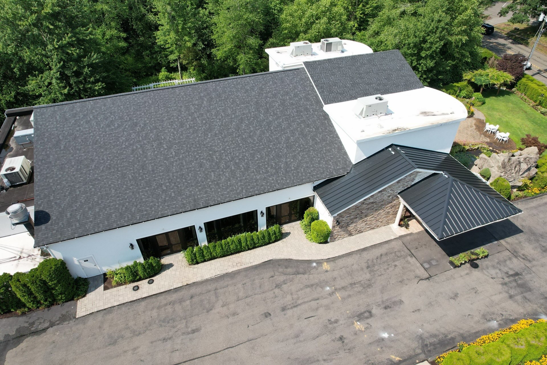 Standing seam metal roofing completed at Cascade in Hamden by Ellis Builders
