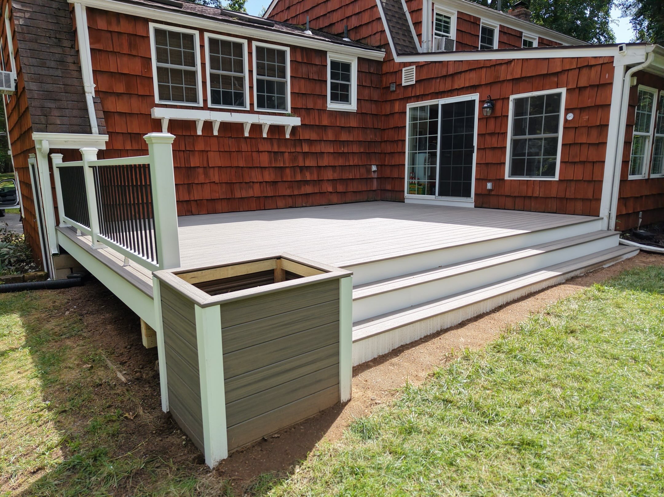 Trex Rocky Harbor deck replacement completed by Ellis Builders in Connecticut